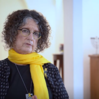 Former hostage Shoshan Haran speaks about being taken captive in video for an Open University award on May 29, 2025 (Courtesy)